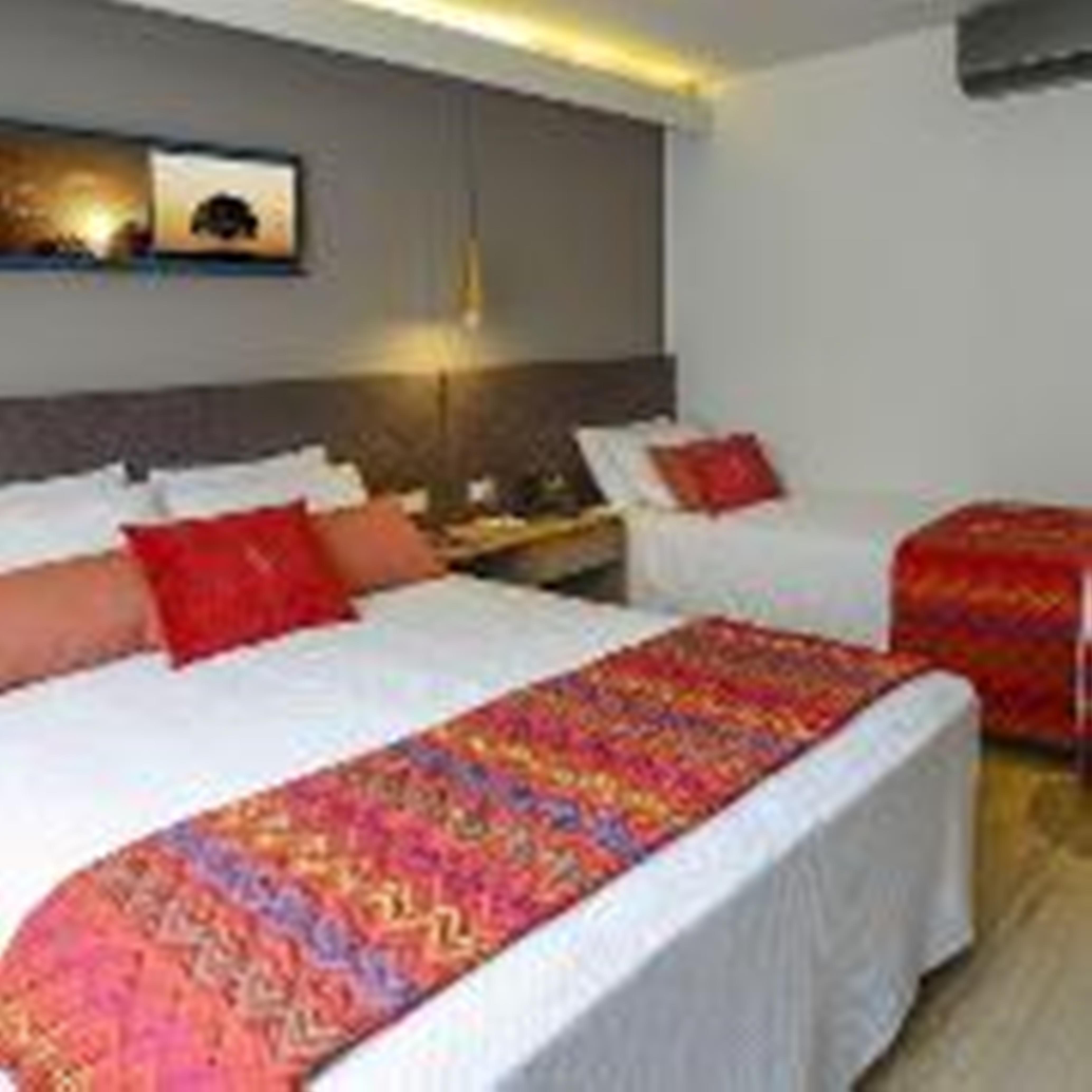 Hotel Laghetto Stilo Centro Gramado Eksteriør billede A bed runner